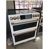 Image 1 : GE CAFE WHITE DUAL DOOR WIFI 5 BURNER INDUCTION OVEN MODEL CCE 750 4M3W2 30" X 30" 36"H