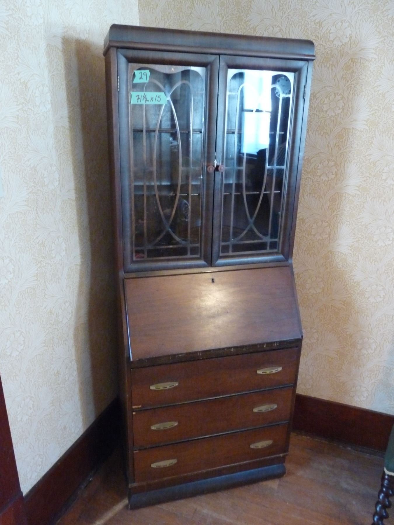 Antique Bookcase With A Pair Of Glass Doors Above A Drop Leaf Desk Base. Below The Drop Leaf Desk Is