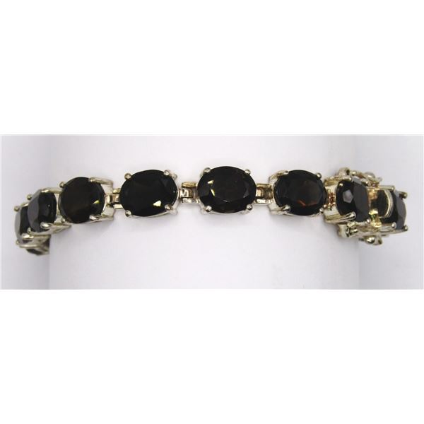 7.5 INCH STERLING AND BROWN STONE TENNIS