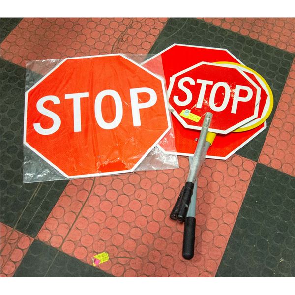 FOUR STOP/SLOW PADDLE SIGNS
