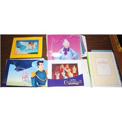 Stack of Disney Lithographs