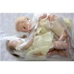 2 little genius Madam Alexander Dolls