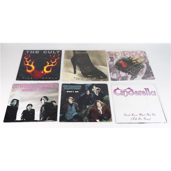 BUNDLE OF RECORD SINGLES INCLUDING THE ROLLING