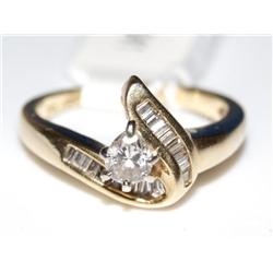 10K Gold Ring With .25ct diamond & baguettes