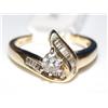 Image 1 : 10K Gold Ring With .25ct diamond & baguettes