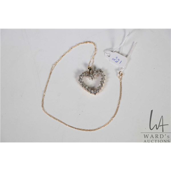 10kt yellow gold and diamond heart shaped pendant on fine 10kt yellow gold 18" neck chain