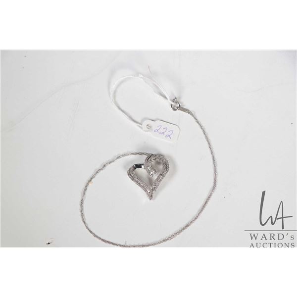 Ladies 10kt white gold 18  fine neck chain with 10kt white gold and diamond, heart shaped pendant