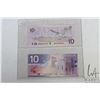 Image 2 : Two Canadian $10 bills with identical serial numbering, one dated 1989 and the other issued 2001 and