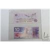 Image 2 : Two Canadian $10 bills with identical serial numbering, one dated 1989 and the other issued 2001 and