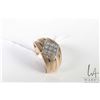 Image 1 : Gent's 10kt yellow gold and diamond melee ring, set with 0.06ct of round cut single white diamonds. 