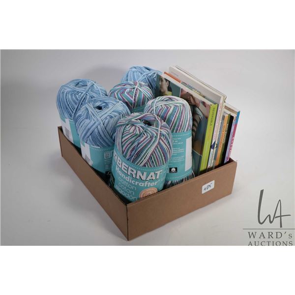 Six 12 oz. balls of Bernat Handicrafter cotton and seven knitting books including "Reversible Knitti