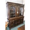 Image 1 : Oak chest on chest china cabinet with two glazed doors, each exposing two adjustable shelves plus as