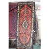 Image 1 : 100% Iranian wool carpet runner "Hamedan" with center medallion, red background and highlights of bl