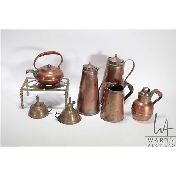 Selection of antique copper and brass ware including two insulated copper carafes with ironstone lin