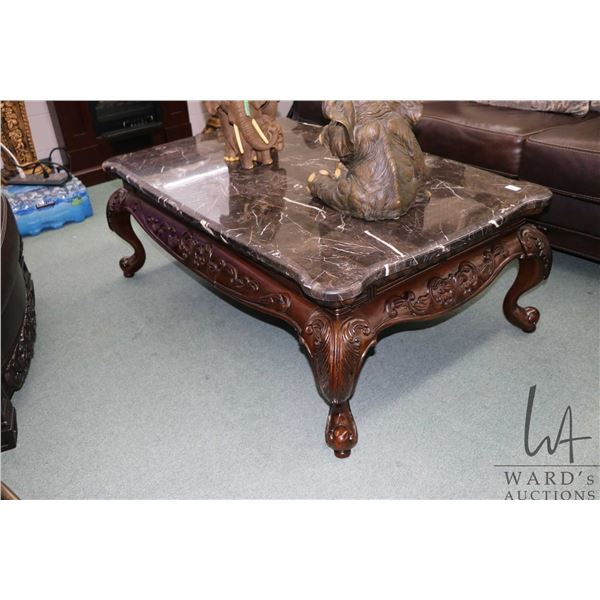 Heavily carved modern three piece parlour set with 54  X 35  coffee table and two 28  square side ta