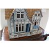 Image 2 : Four room Tudor dollshouse, with white picket fence, plastic windows and cedar shakes, 25" X 17" X 2