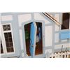 Image 3 : Four room Tudor dollshouse, with white picket fence, plastic windows and cedar shakes, 25" X 17" X 2