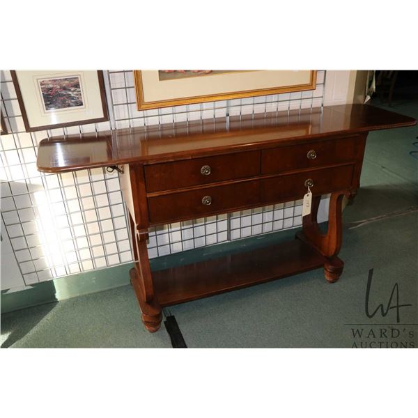 Semi contemporary four drawer server made by Broyhill with lyre supports, 49" wide plus two 12" drop