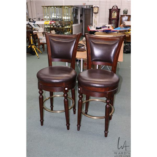 Pair of modern high back, swivel bar stools with 30" seat height