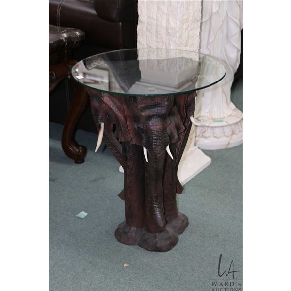 Triple elephant face resin side table 24" in height with 20" diameter glass topper