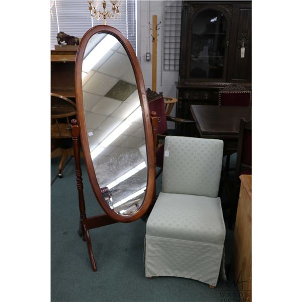 Contemporary floor standing cheval mirror, 61" in height and an upholstered slipper chair