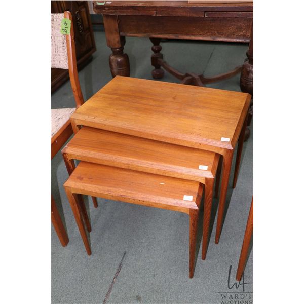 Set of three teak mid century modern nesting tables made in Denmark by Silkeborg