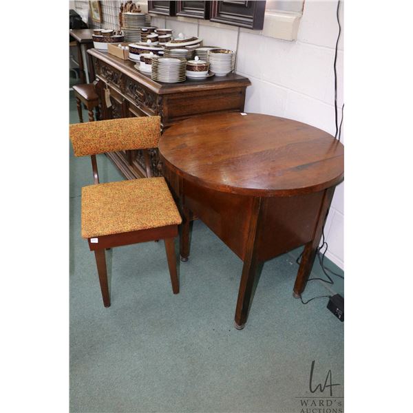 Antique quarter cut oak tilt top sewing table with fitted interior, 27  in diameter, plus a small no