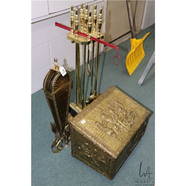 Fan style brass fireplace screen and a four piece companion set with stand and a vintage bas relief,