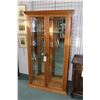 Image 1 : Modern two door illuminated curio cabinet with glass sides, beveled glass doors, mirrored back and f