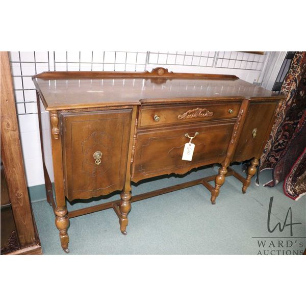 Antique walnut sideboard with three doors, single drawer and low backboard, 66" wide, 20" deep and 3