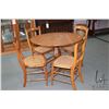 Image 1 : Four antique side chairs with caned seats and primitive 36" diameter center pedestal table