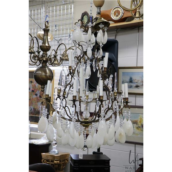 Modern wrought iron twelve branch chandelier with hanging crystal lusters and large alabaster stone 