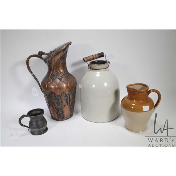 Two pieces of stoneware including 10  one gallon handled jug and a glazed pitcher plus a small pewte