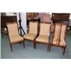 Image 1 : Four upholstered mahogany, Regency style chairs with brass paw front feet