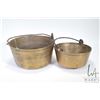 Image 1 : Graduated set of heavy brass jelly pans with iron handles, 9" and 11" in diameter