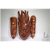 Image 1 : Three heavy carved wooden masks ranging from 18 1/2" X 24"