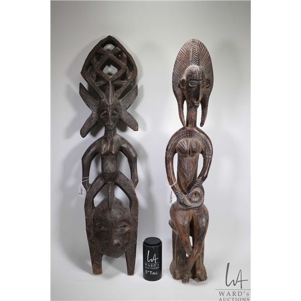 Two vintage wooden African sculptures including 31  figure and 31  wall mount