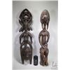 Image 1 : Two vintage wooden African sculptures including 31" figure and 31" wall mount