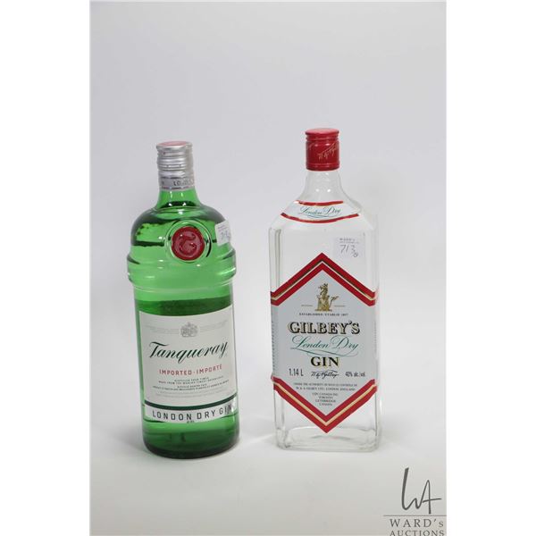 Two bottles of gin including Tanqueray/ 1.14 ltrs / 40% ABV and bottle Gilbey's/ 1.14 ltrs. 40% ABV 