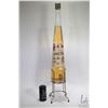 Image 1 : Liquore Galliano/ 3.8 ltrs/ 35% ABV in brass coloured galley stand, bottle is fitted with spigot, no