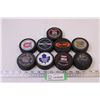 (9) Pucks