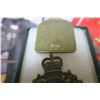 Image 5 : RCMP lot, lapel pins, book, metal logo, key chain, post cards