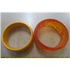 Image 2 : Yellow bakelite bangle and orange & yellow swirl lucite bangle