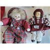 Image 2 : Porcelain head dolls & clown. One doll made in Cuba. Small wicker chair.