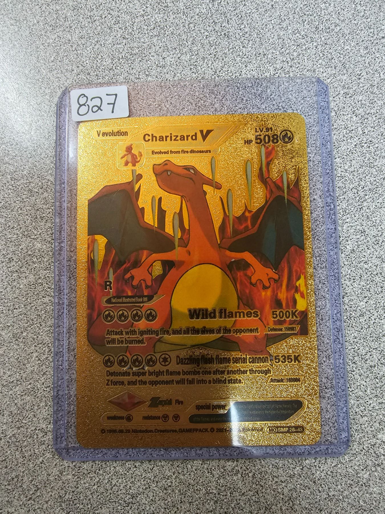 Charizard V gold metal pokemon card - Schmalz Auctions Charizard V gold metal pokemon card - Schmalz Auctions
