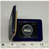 Image 1 : 1973 PEI Centennial Specimen Nickel Dollar. Bright White. Housed in its original blue clamshell case