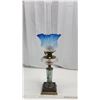 Image 1 : Antique coal oil lamp 30.5” (78 cm) tall with chimney. 2 cracks in blue shade. Used for display only
