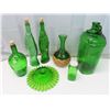 Image 5 : 7 Green Glass items: 2 fish decanters, 1 decanter, 1 pouring jar, candy plate, vase, bottle.