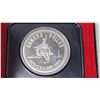 Image 2 : 1975 Calgary Centennial Silver Dollar. Specimen. Bright White. Housed in its original black clamshel