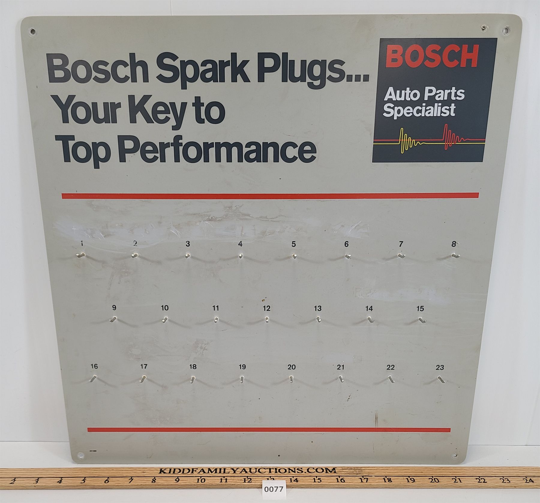 BOSCH SPARK PLUGS AD ON SERVICE STATION KEY HOLDER - Kidd Family Auctions